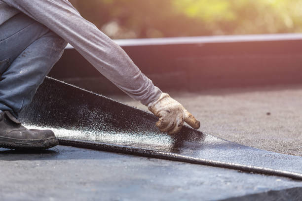 Professional Waterproofing technician working in Coram, NY